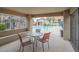 Covered lounge area offers shade and seating with views of the community pool and recreation area at 839 S Westwood -- # 170, Mesa, AZ 85210