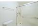 The modern walk-in shower has a grab bar and sliding glass door at 839 S Westwood -- # 170, Mesa, AZ 85210