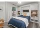 Bedroom featuring a stylish Murphy bed with built-ins and a window with natural light at 9013 E Shooting Star Dr, Gold Canyon, AZ 85118