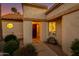 Inviting front entrance with beautiful desert landscaping and a charming window box accent at 9121 W Topeka Dr, Peoria, AZ 85382