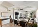 Spacious living room features vaulted ceilings, stone fireplace, and large windows at 9221 N Camino Vista Ln, Phoenix, AZ 85028