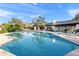 Community pool offering a refreshing escape with ample lounge seating and desert views at 9221 N Camino Vista Ln, Phoenix, AZ 85028