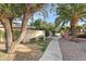 Charming walkway with desert landscaping leads to this inviting home with curb appeal at 9221 N Camino Vista Ln, Phoenix, AZ 85028