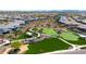 Aerial view of a community putting green showcasing lush landscaping and recreational space at 16683 S 180Th Dr, Goodyear, AZ 85338