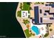 Overhead view of backyard featuring waterfront, covered patio, outdoor seating, landscaping, and a pool at 16683 S 180Th Dr, Goodyear, AZ 85338
