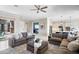 Open living room with seamless flow to kitchen and backyard, showcasing modern design at 16683 S 180Th Dr, Goodyear, AZ 85338