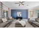 Elegant living room with chic decor, comfortable sofas, and accent wall at 16683 S 180Th Dr, Goodyear, AZ 85338