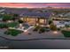 Striking home with solar panels, covered patio, a firepit, and a refreshing pool at 16683 S 180Th Dr, Goodyear, AZ 85338