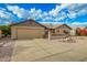 Charming single-story home with desert landscaping and a two-car garage with ample parking space at 2245 Leisure World --, Mesa, AZ 85206