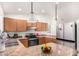 Bright kitchen with stainless steel appliances and granite countertops, creating a warm and inviting space at 2245 Leisure World --, Mesa, AZ 85206