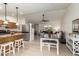 Open floor plan featuring a breakfast bar, dining table, and living room, perfect for entertaining at , Mesa, AZ 85206