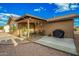 Outdoor patio with a covered seating area and barbeque at 2245 Leisure World --, Mesa, AZ 85206