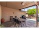 Covered patio with outdoor seating, a dining set, and a barbeque at 2245 Leisure World --, Mesa, AZ 85206
