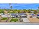 Beautiful home boasts manicured landscaping, a white fence, and a private pool in a desirable location at 11039 N 42Nd St, Phoenix, AZ 85028