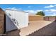Metal shed offers ample storage with desert landscaping at 1120 S Valley Dr, Apache Junction, AZ 85120