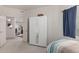 Bright bedroom featuring a mirrored closet and view to living area at 16801 N 94Th St # 2056, Scottsdale, AZ 85260