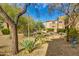 Tranquil landscaping with trees and shrubs around community building at 16801 N 94Th St # 2056, Scottsdale, AZ 85260