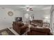 Cozy living room featuring plush sofas, decorative lamps, and a large television at 16801 N 94Th St # 2056, Scottsdale, AZ 85260