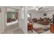 The open-concept living room and bedroom area features carpeted floors at 16801 N 94Th St # 2056, Scottsdale, AZ 85260