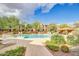 Beautiful community pool with desert landscaping and a pool house at 16801 N 94Th St # 2056, Scottsdale, AZ 85260