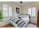 Inviting bedroom features bright natural light and charming southwest decor at 1701 W Clarendon Ave, Phoenix, AZ 85015