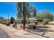 Corner lot home featuring desert landscaping, a well maintained lawn, and a vintage street sign at 1701 W Clarendon Ave, Phoenix, AZ 85015