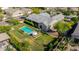 Gorgeous backyard with a sparkling blue pool, manicured lawn, and meticulous landscaping on this beautiful home at 17690 E Bronco Dr, Queen Creek, AZ 85142
