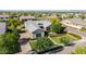 Stunning aerial view of a home with a well-maintained yard and beautiful landscaping at 17690 E Bronco Dr, Queen Creek, AZ 85142