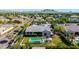 Stunning aerial view of backyard featuring a sparkling blue pool and perfectly manicured lawn in a beautiful neighborhood at 17690 E Bronco Dr, Queen Creek, AZ 85142
