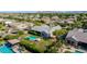 Lush backyard with sparkling pool, green lawn, and meticulous landscaping create a private oasis in this beautiful property at 17690 E Bronco Dr, Queen Creek, AZ 85142