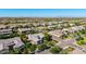 Neighborhood aerial view showcasing beautiful desert landscaping, community and mountain views at 17690 E Bronco Dr, Queen Creek, AZ 85142