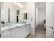 Bathroom with double vanity sinks, ample counter space, and bright lighting at 17690 E Bronco Dr, Queen Creek, AZ 85142