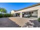 Spacious three-car garage with cars, epoxied floors, and decorated with sport memorabilia at 17690 E Bronco Dr, Queen Creek, AZ 85142