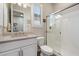 Clean bathroom with a shower, single vanity, white cabinets, and tile floors at 18225 N 66Th Way, Phoenix, AZ 85054