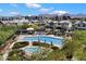 Beautiful community pool with spa, lounge chairs and umbrellas; a perfect place to relax and socialize at 18225 N 66Th Way, Phoenix, AZ 85054