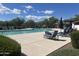 Relaxing community pool area with comfortable lounge chairs, ideal for residents at 18225 N 66Th Way, Phoenix, AZ 85054