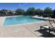 Large community pool with lounge chairs, offering a refreshing oasis for residents at 18225 N 66Th Way, Phoenix, AZ 85054