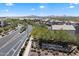 Welcome to Paradise Ridge! A beautiful community entrance sign with manicured landscaping and mountain views at 18225 N 66Th Way, Phoenix, AZ 85054