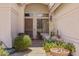 Charming front entryway featuring desert landscaping, a security door, and decorative plants at 1943 E Drake Dr, Tempe, AZ 85283