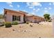 Charming single-story home boasting a desert-landscaped front yard and a spacious three-car garage at 1943 E Drake Dr, Tempe, AZ 85283