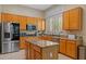 Kitchen featuring stainless steel appliances, and a center island at 1943 E Drake Dr, Tempe, AZ 85283