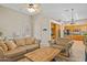 Spacious living room open to the kitchen featuring a comfortable seating arrangement at 1943 E Drake Dr, Tempe, AZ 85283