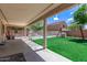 Spacious backyard featuring a pool, a hammock, and a swing set for Gathering enjoyment at 23119 W Papago St, Buckeye, AZ 85326
