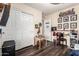Bedroom features closet, wood floors, and decorative accents to create a personalized space at 23119 W Papago St, Buckeye, AZ 85326