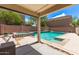 Stunning pool area with a spa, perfect for relaxation and outdoor entertainment at 23119 W Papago St, Buckeye, AZ 85326