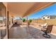 Covered back patio with nice stone pavers and a small area for relaxing by a fire pit at 2356 N Glenview --, Mesa, AZ 85213