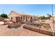 Backyard area with built in BBQ, garden, covered patio, and gravel landscaping at 2356 N Glenview --, Mesa, AZ 85213