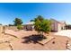 Outdoor space with a mature citrus tree, low maintenance gravel, and block wall fencing at 2356 N Glenview --, Mesa, AZ 85213