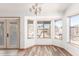 Charming dining area features an abundance of natural light, views of the yard, and easy patio access at 2356 N Glenview --, Mesa, AZ 85213