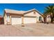 Charming home featuring a spacious driveway, three-car garage and desert landscaping at 2356 N Glenview --, Mesa, AZ 85213